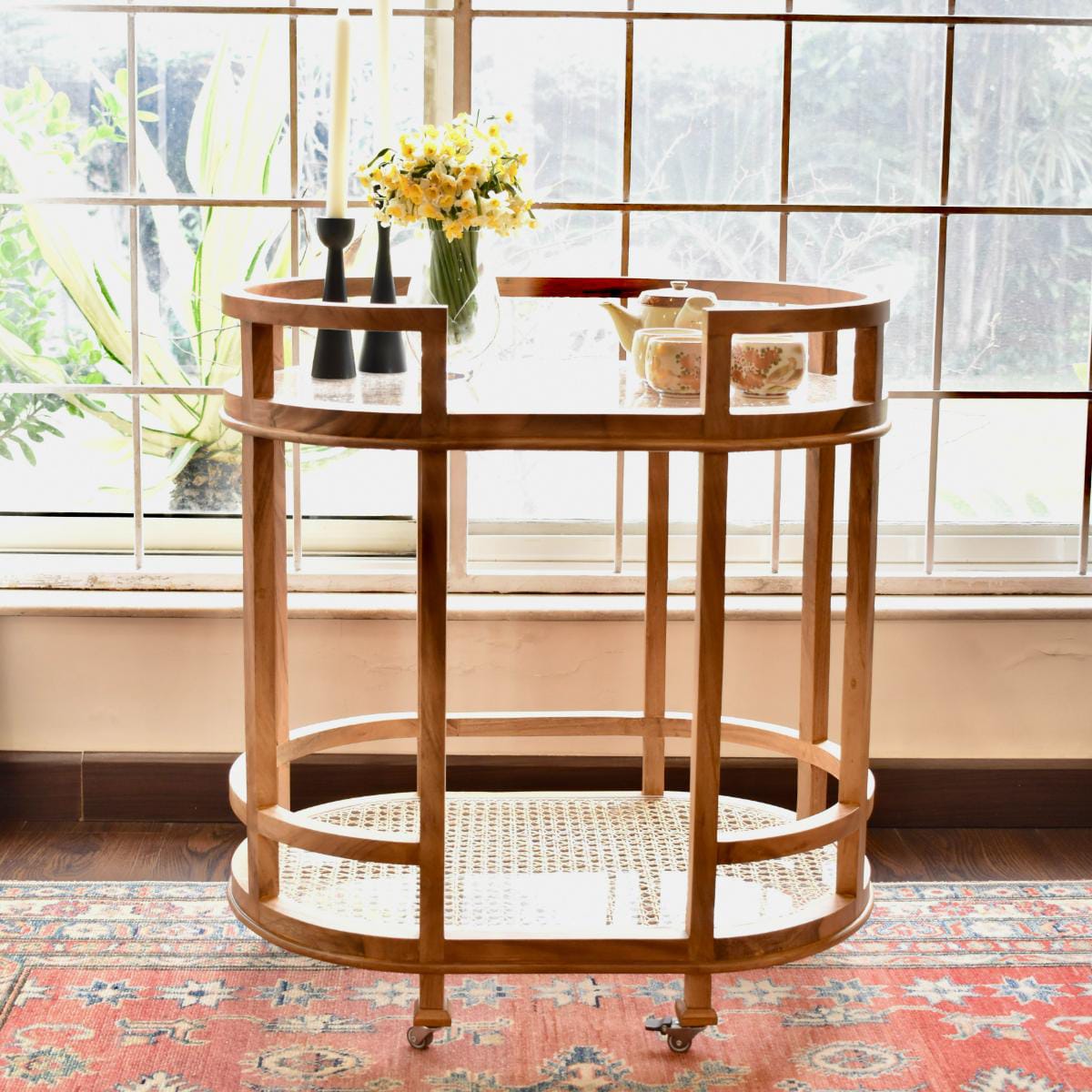 "Willow rattan tea trolley with wood frame and wheels"