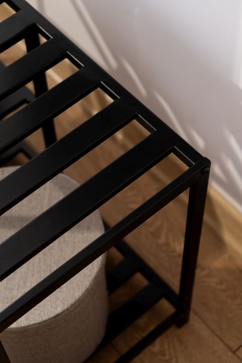 double-shelf metal shoe rack close-up
