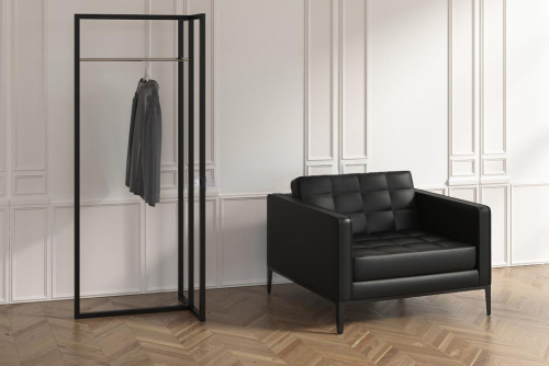 freestanding metal clothes rack close-up