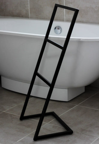 freestanding metal towel rack close-up