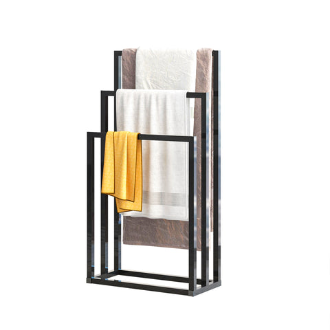 metal towel stand holding bath towels