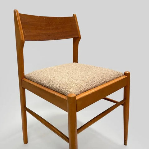 wood dining chair angled close-up