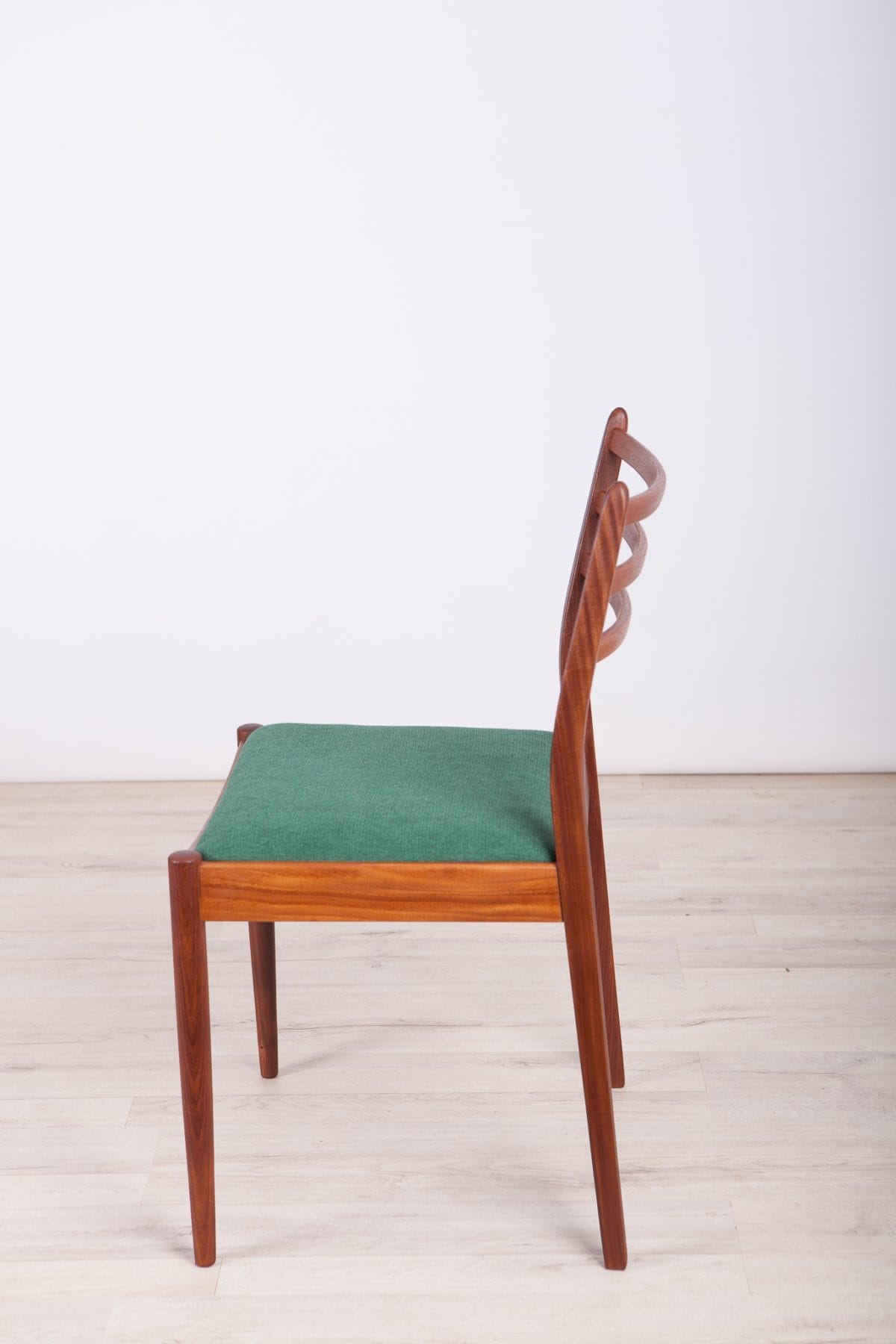 wooden dining chair angled view